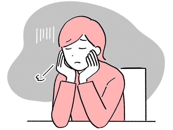 暗い表情の女性